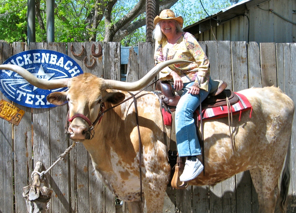 Karen mounted on a Texas longhorn